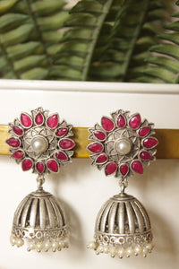Ruby Red Natural Gemstones Embedded Silver Finish Flower Motif Brass Jhumka Earrings