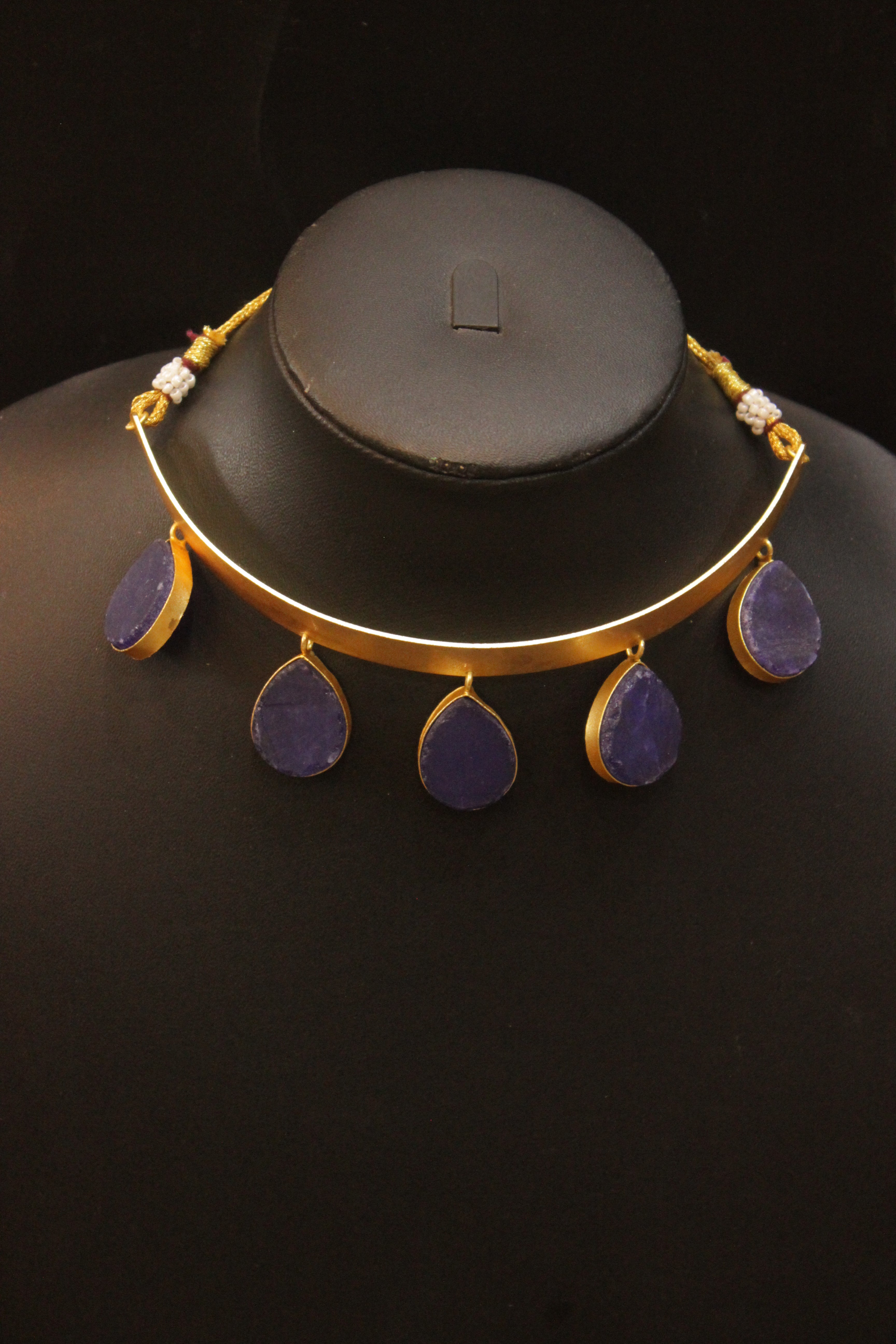 Violet Tear Drop Shaped Raw Natural Gemstones Embedded Gold Toned Versatile Hasli Style Brass Necklace Set