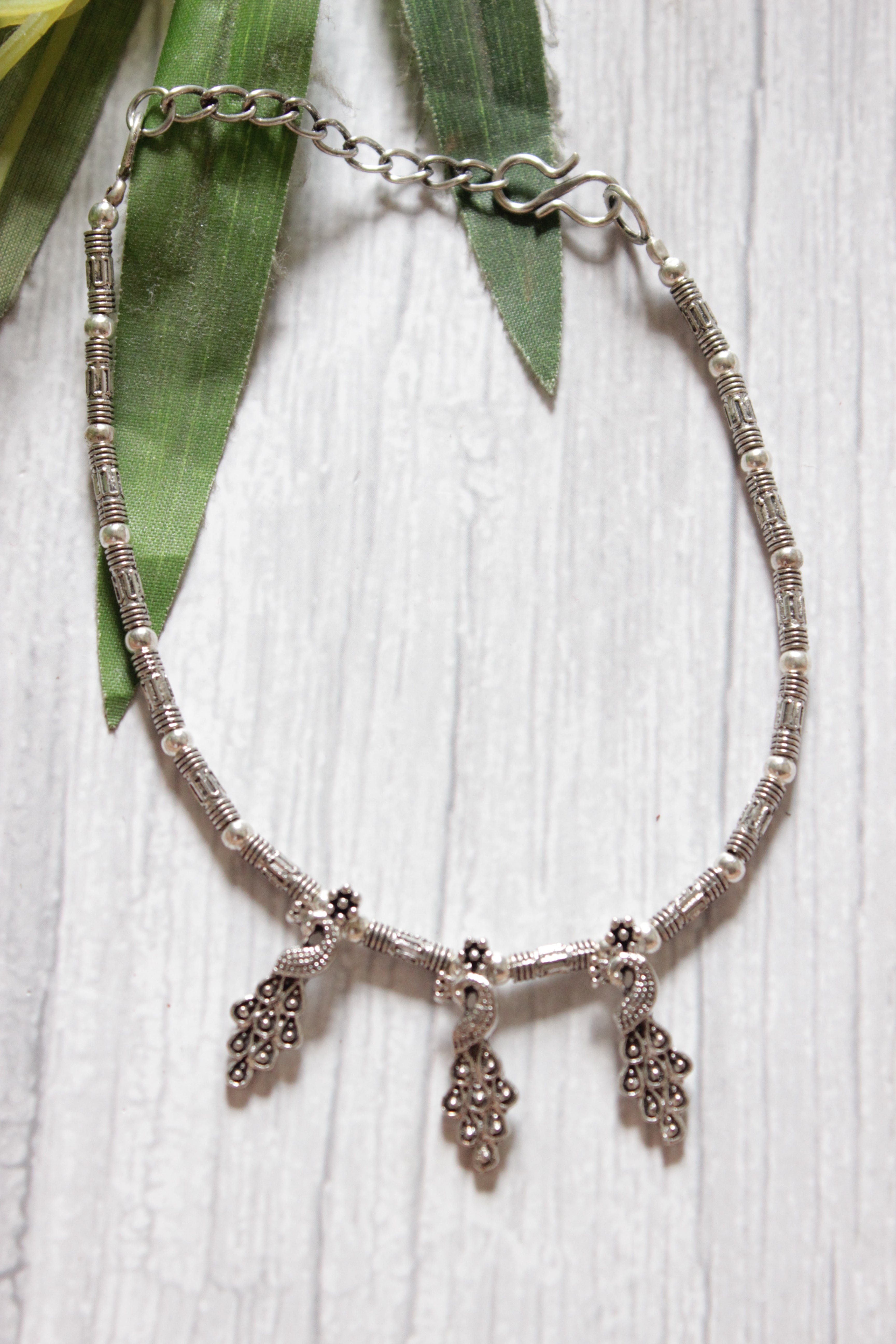 Silver Finish Single Metal Anklet Accentuated with Peacock Metal Accents