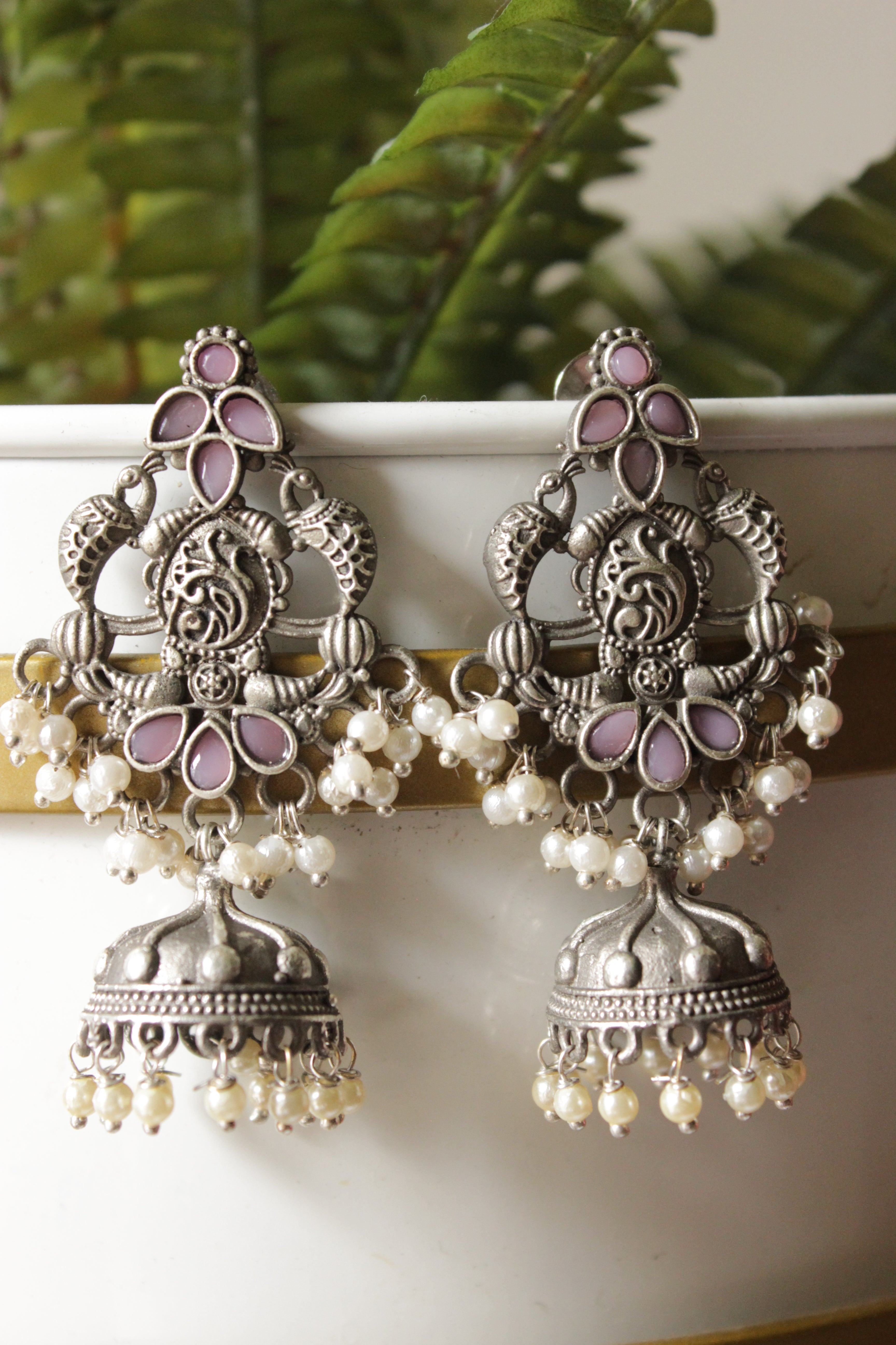 Intricately Detailed Glass Stones Embedded Brass Statement Dangler Earrings Accentuated with White Beads
