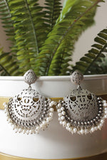 Load image into Gallery viewer, Jaali Pattern Silver Finish Brass Dangler Earrings Accentuated with White Beads
