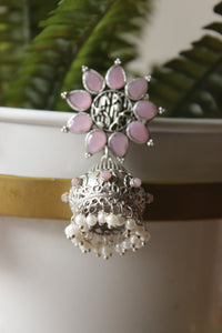 Baby Pink Glass Stones Embedded Silver Finish Flower Motif Dangler Jhumka Earrings in Brass