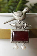 Load image into Gallery viewer, Peacock Motif Ruby Red Glass Stone Embedded Silver Finish Brass Dangler Earrings
