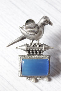 Peacock Motif Royal Blue Glass Stone Embedded Silver Finish Brass Dangler Earrings