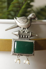 Load image into Gallery viewer, Peacock Motif Bottle Green Glass Stone Embedded Silver Finish Brass Dangler Earrings
