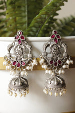 Load image into Gallery viewer, Intricately Detailed Red Glass Stones Embedded Brass Statement Dangler Earrings Accentuated with White Beads
