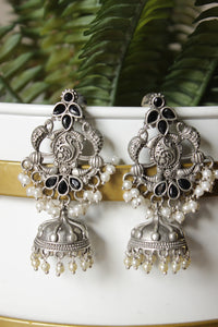 Intricately Detailed Black Glass Stones Embedded Brass Statement Dangler Earrings Accentuated with White Beads