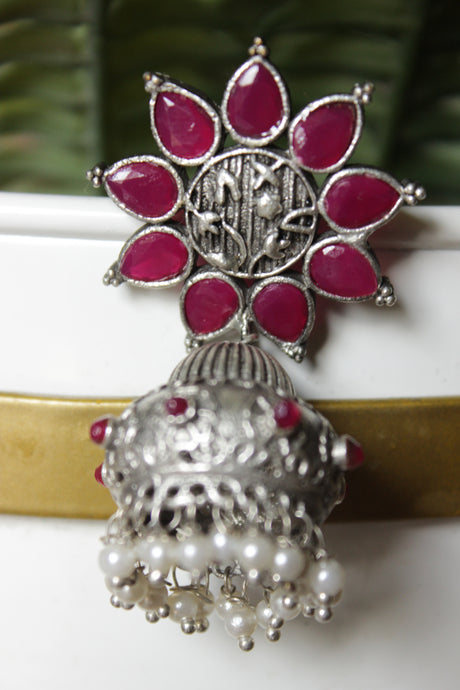 Bridal Plum Glass Stones Embedded Silver Finish Flower Motif Dangler Jhumka Earrings in Brass