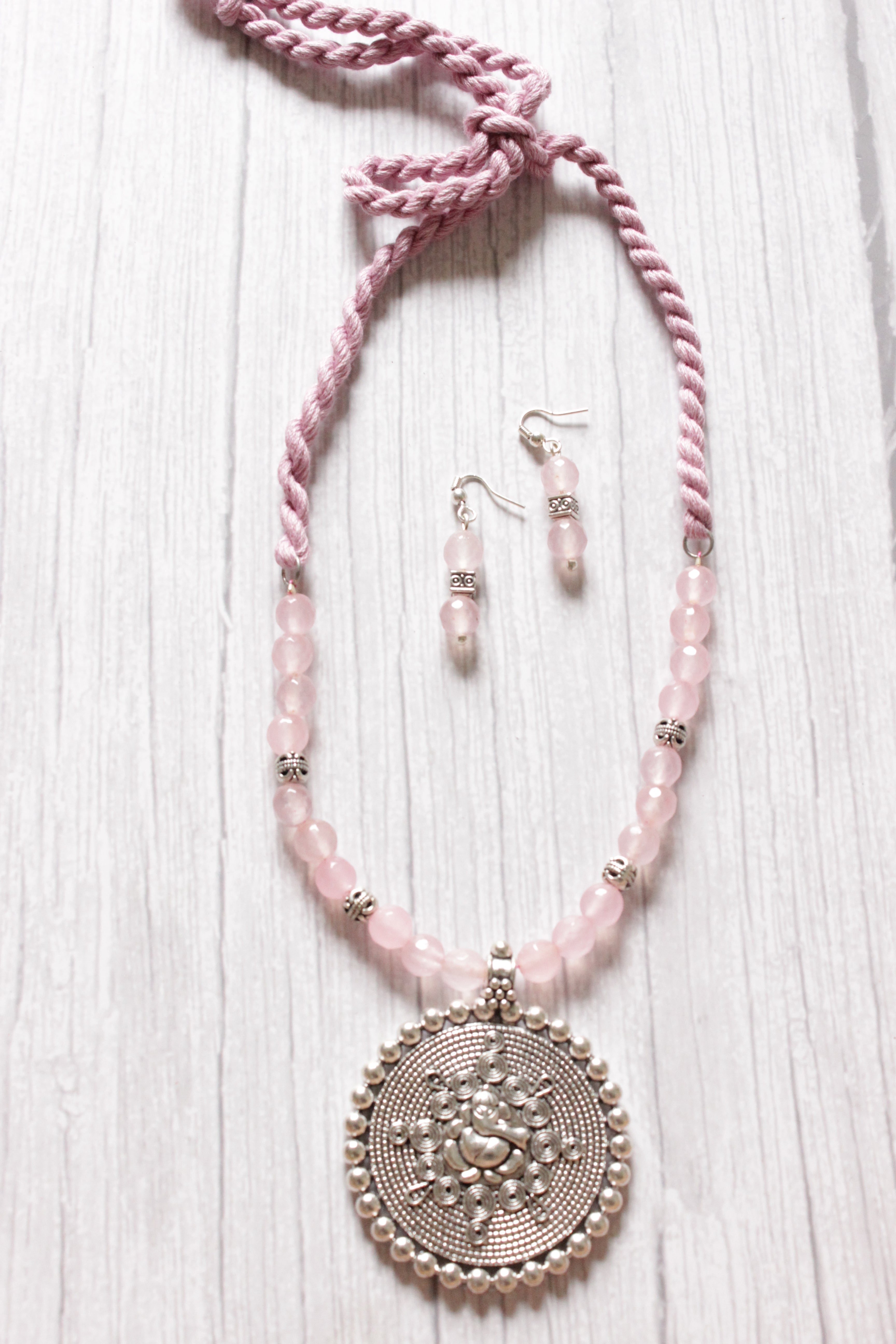 Baby Pink Jade Beads Rope Closure Necklace Set with Silver Finish Ganesha Metal Pendant