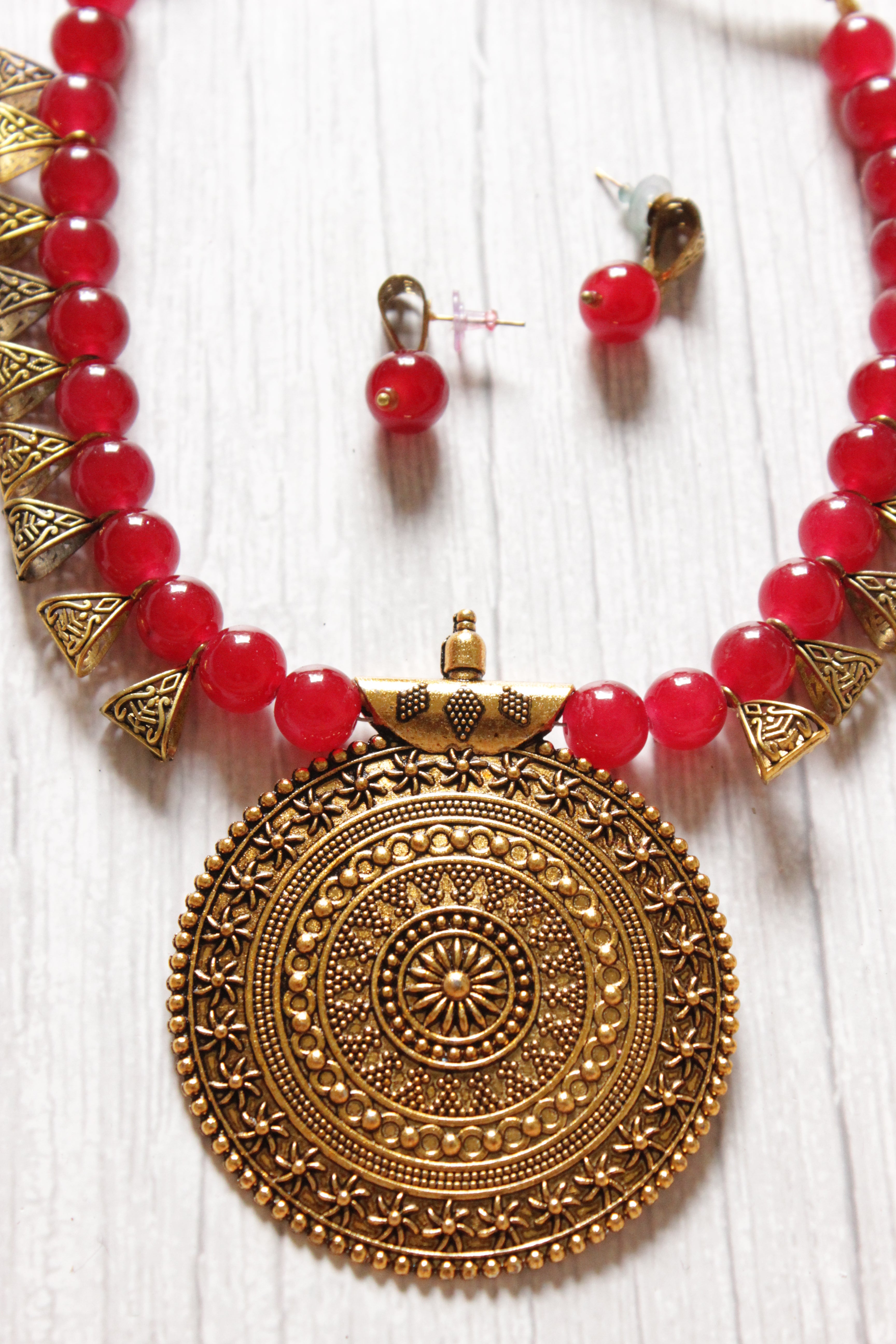 Gold-Toned Red Glass Beads Necklace Set with Statement Pendant