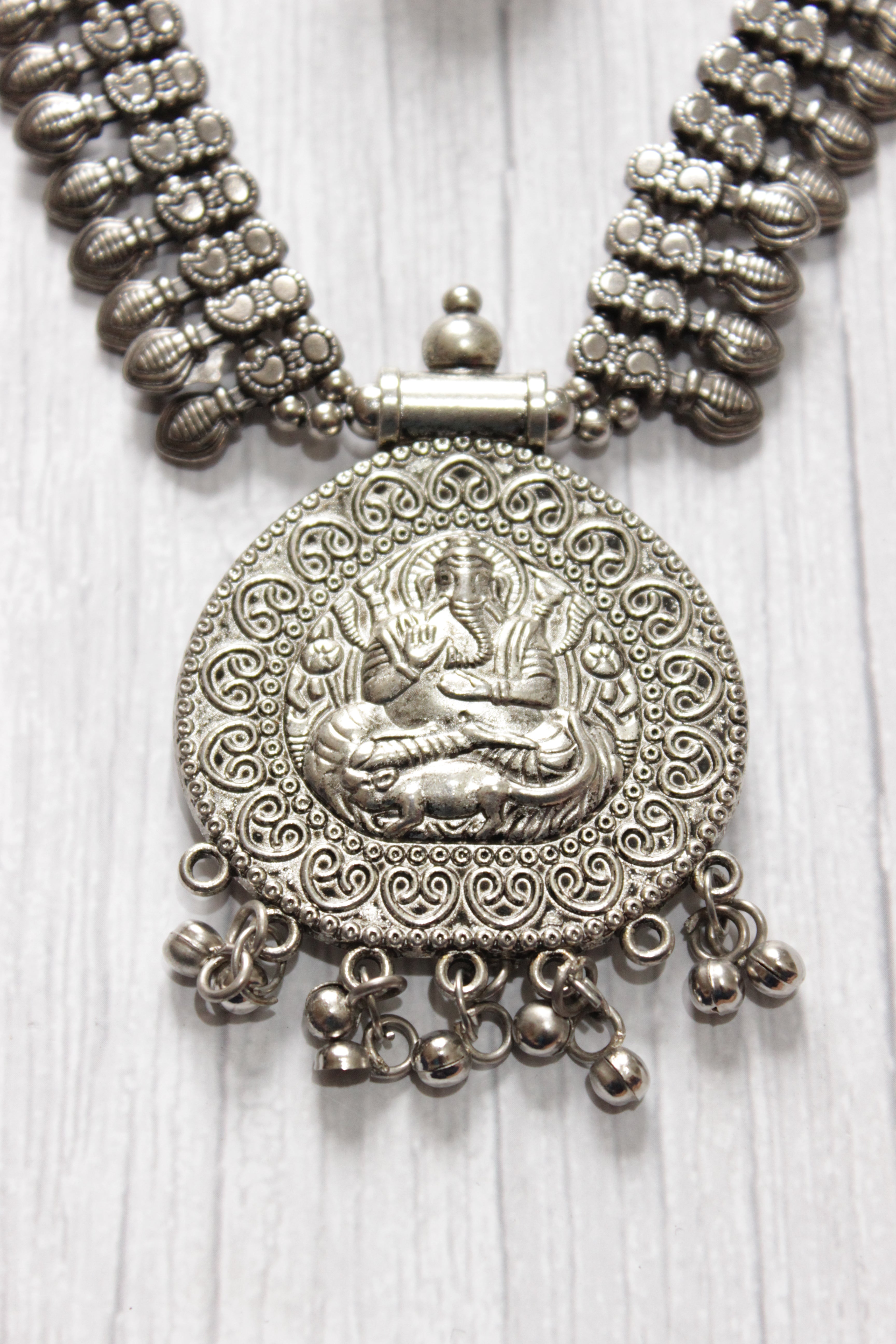 Elaborately Detailed Ganesha Pendant Long Necklace Set with Jhumka Earrings