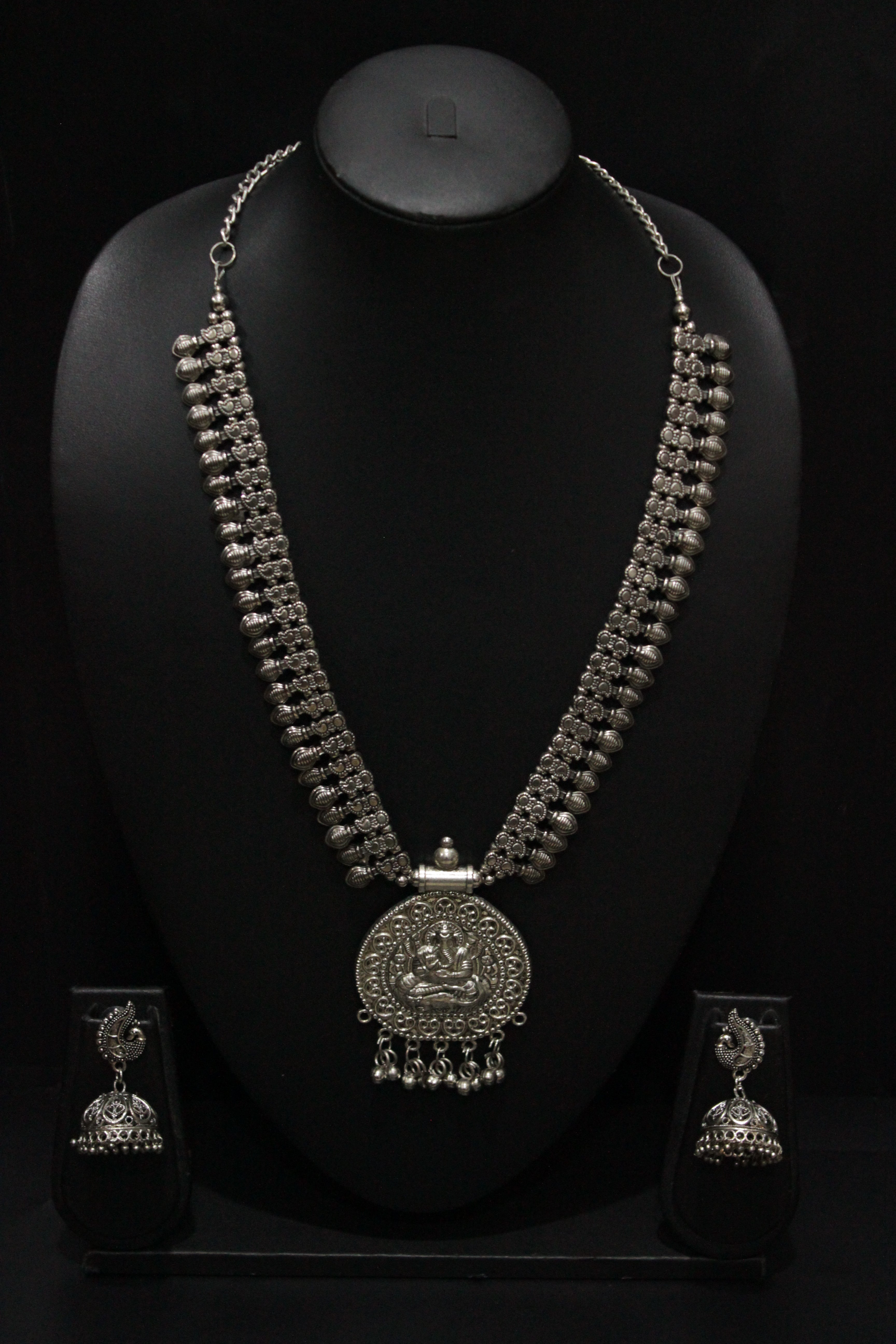 Elaborately Detailed Ganesha Pendant Long Necklace Set with Jhumka Earrings