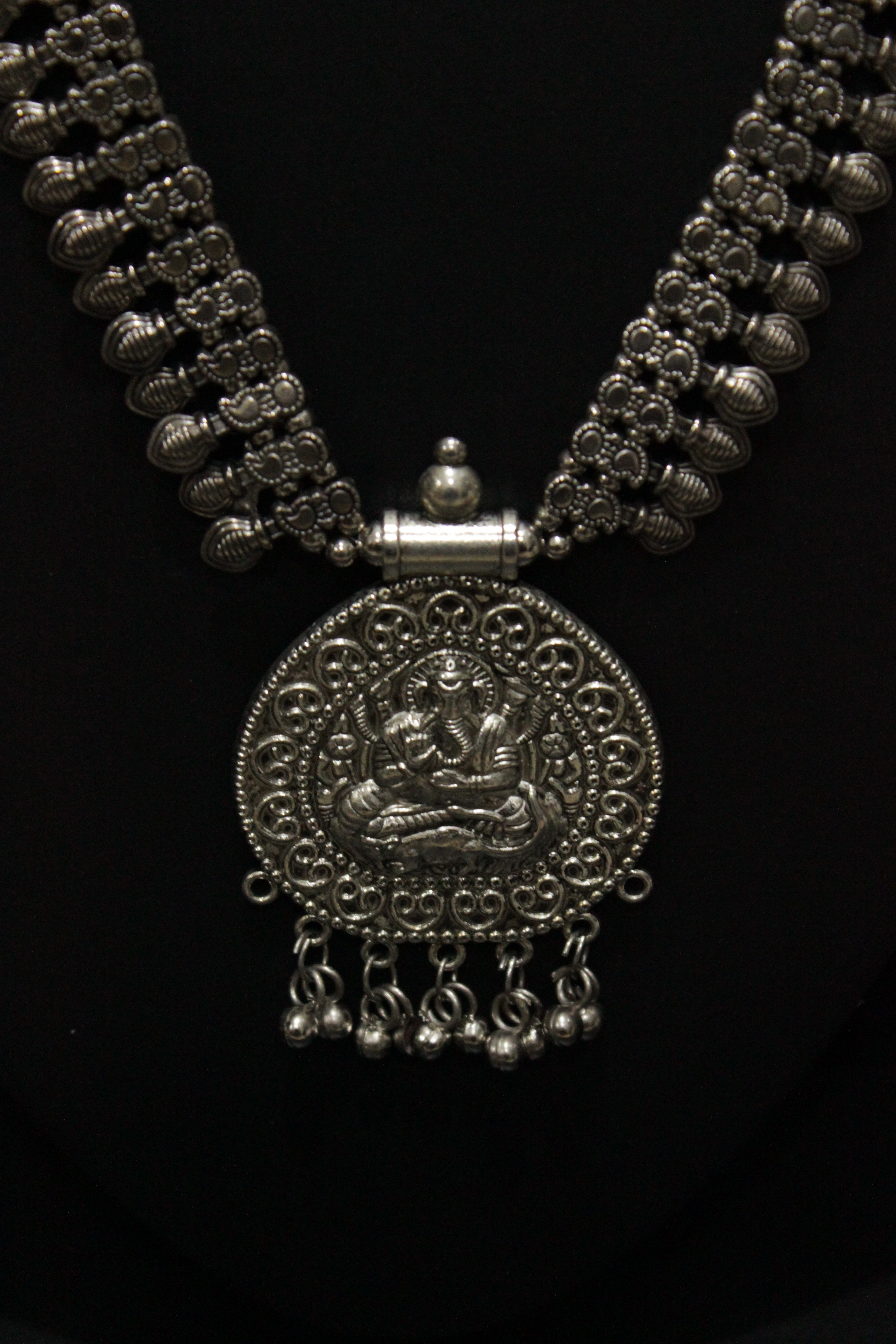 Elaborately Detailed Ganesha Pendant Long Necklace Set with Jhumka Earrings