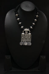 Intricately Detailed Statement Pendant Necklace with Stamped Coins and Thread Closure