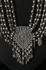 Load image into Gallery viewer, Oxidised Silver Finish Elaborate Metal Necklace Set with Adjustable Thread Closure
