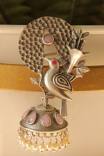 Load image into Gallery viewer, Pink Stones Embedded Silver Finish Peacock Motif Statement Dangler Earrings Accentuated with White Beads
