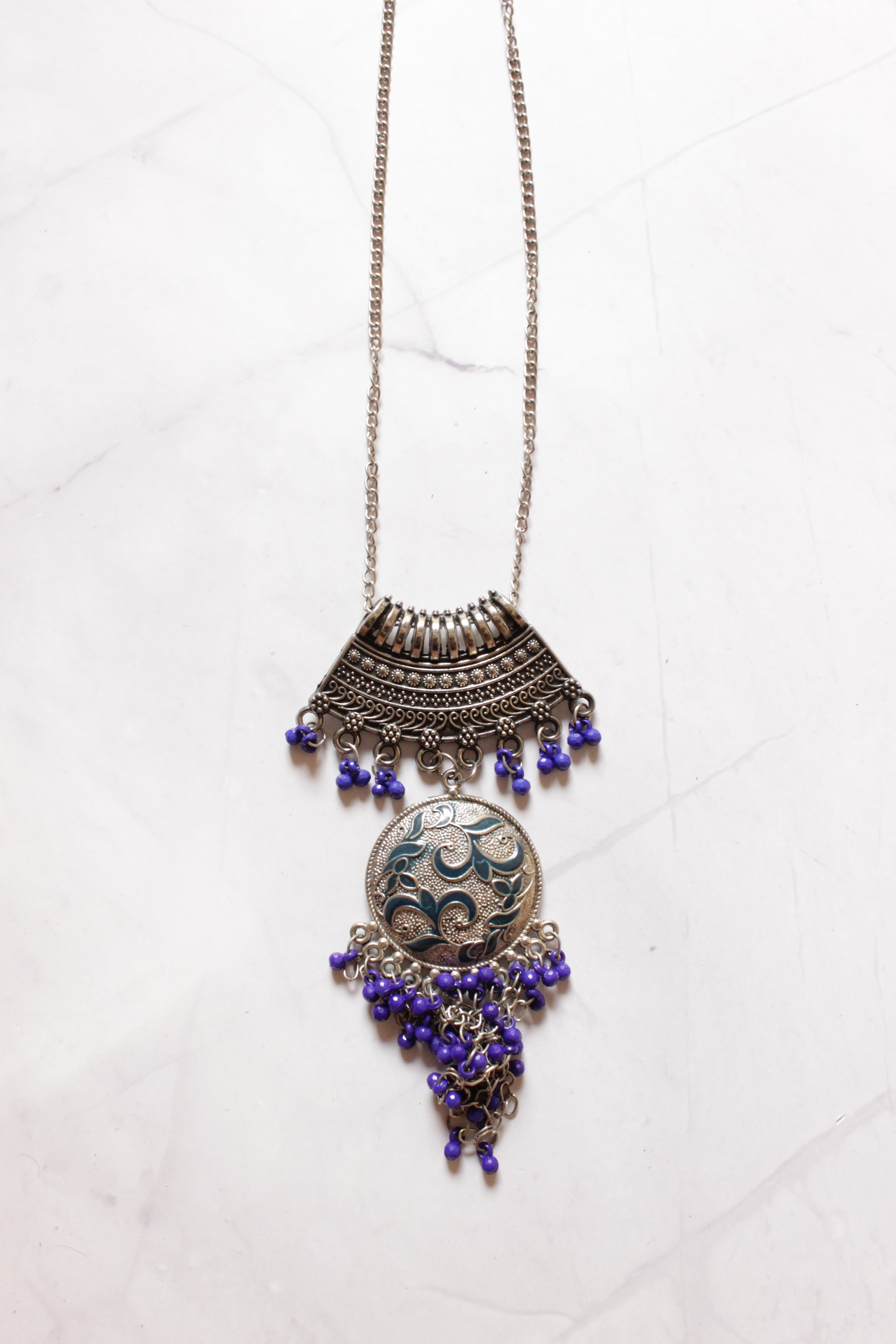 Silver Finish Tibetan Necklace Accentuated with Violet Beads