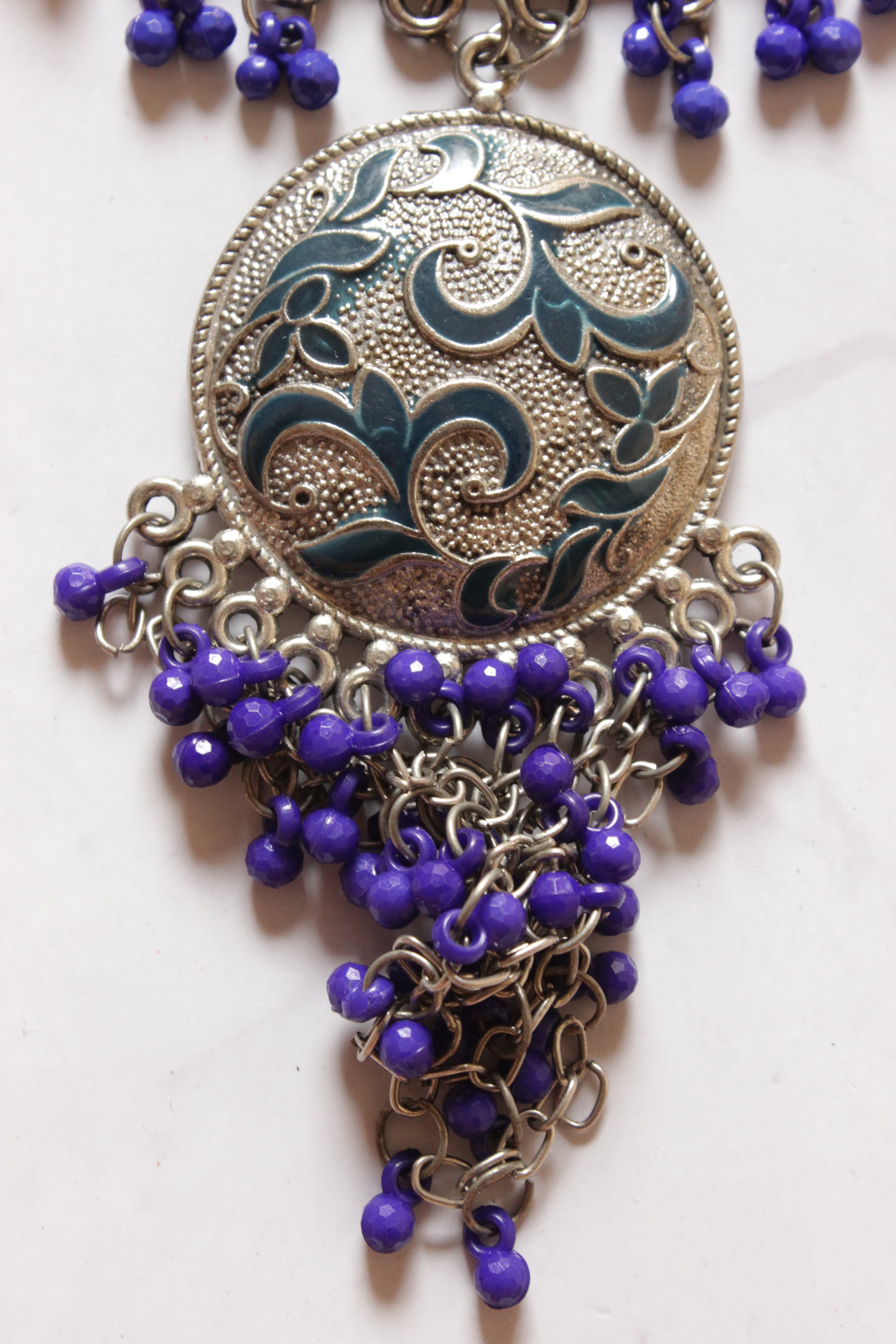 Silver Finish Tibetan Necklace Accentuated with Violet Beads
