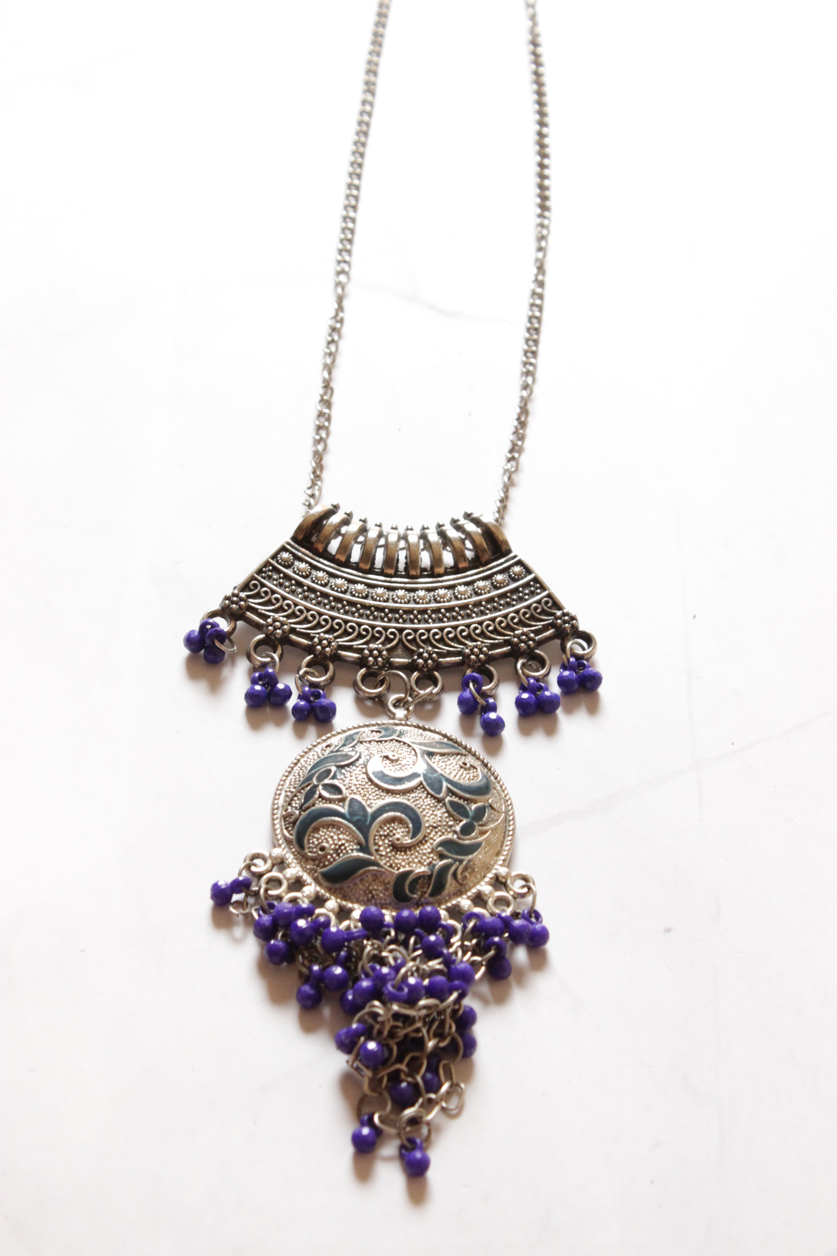 Silver Finish Tibetan Necklace Accentuated with Violet Beads