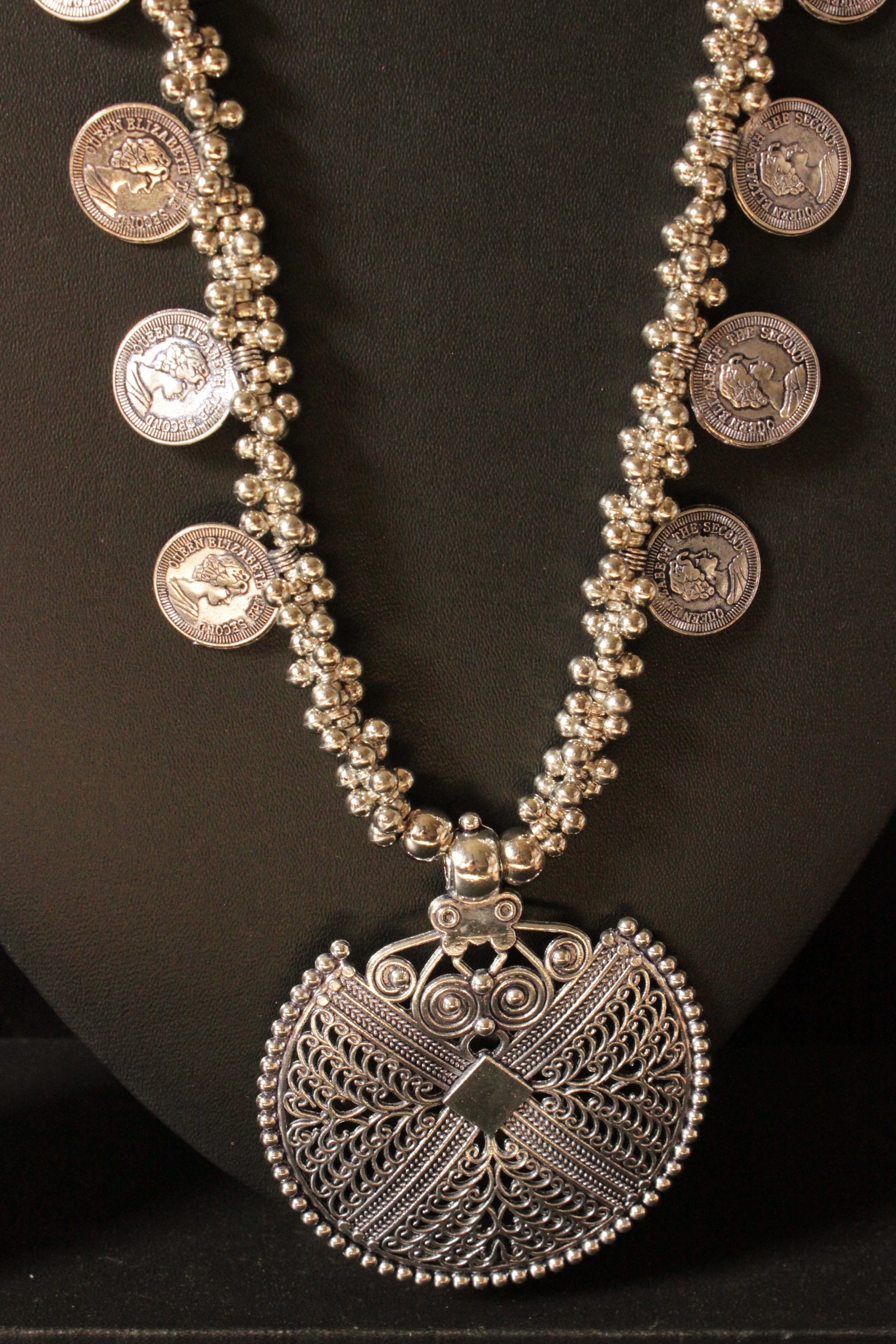 Metal Stamped Coins and Ghungroo Beads Embellished Silver Finish Long Necklace