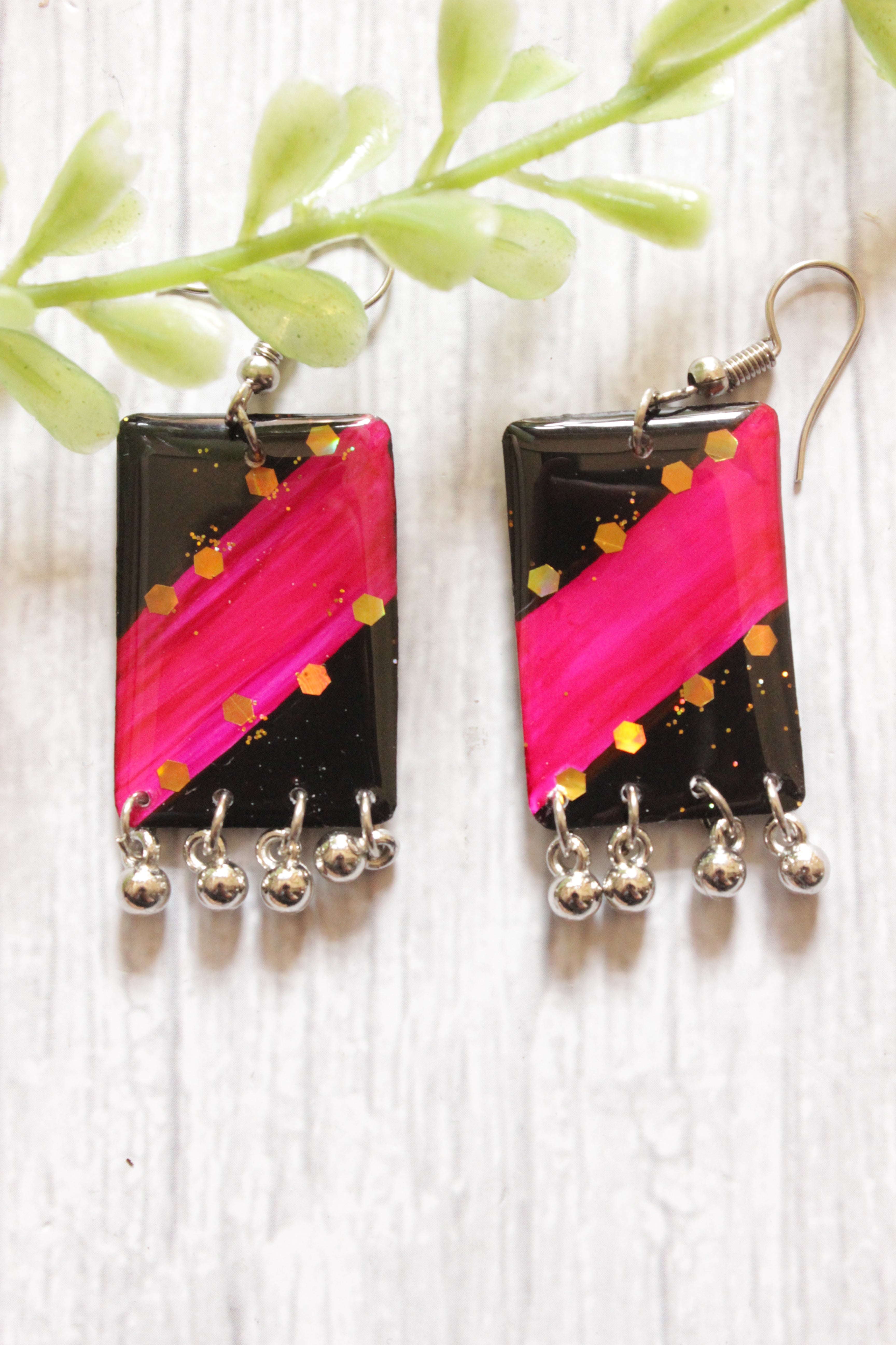 Black and Pink Hand Painted Shape Resin Earrings with Metal Ghungroo Accents