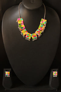 Multi-Color Resin Necklace Set Embellished with Ghungroo Beads Accents and comes with Stud Earrings