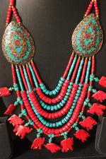 Load image into Gallery viewer, Turquoise and Red Beads Hand Beaded Statement African Tribal Necklace with Elephant Charms
