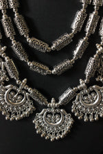 Load image into Gallery viewer, 3 Layer Elaborate Silver Finish Metal Necklace Set with Dangler Earrings
