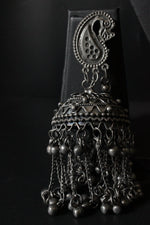 Load image into Gallery viewer, Peacock Motif Oxidised Finish Jhumka Earrings with Long Metal Beads Strands
