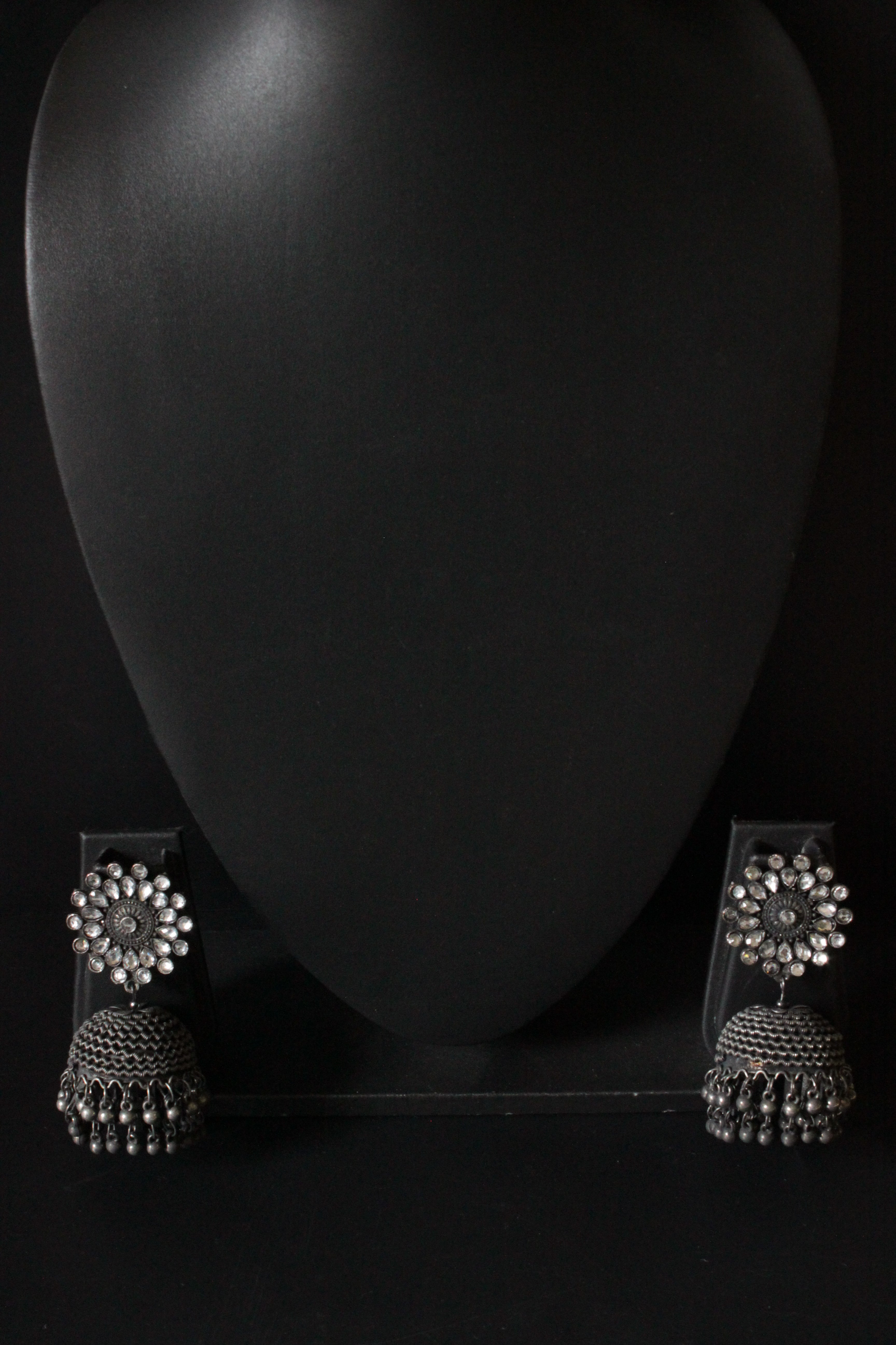 White Glass Stones Embedded Oxidised Finish Jhumkas with Bead Strings