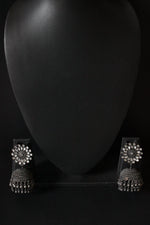 Load image into Gallery viewer, White Glass Stones Embedded Oxidised Finish Jhumkas with Bead Strings
