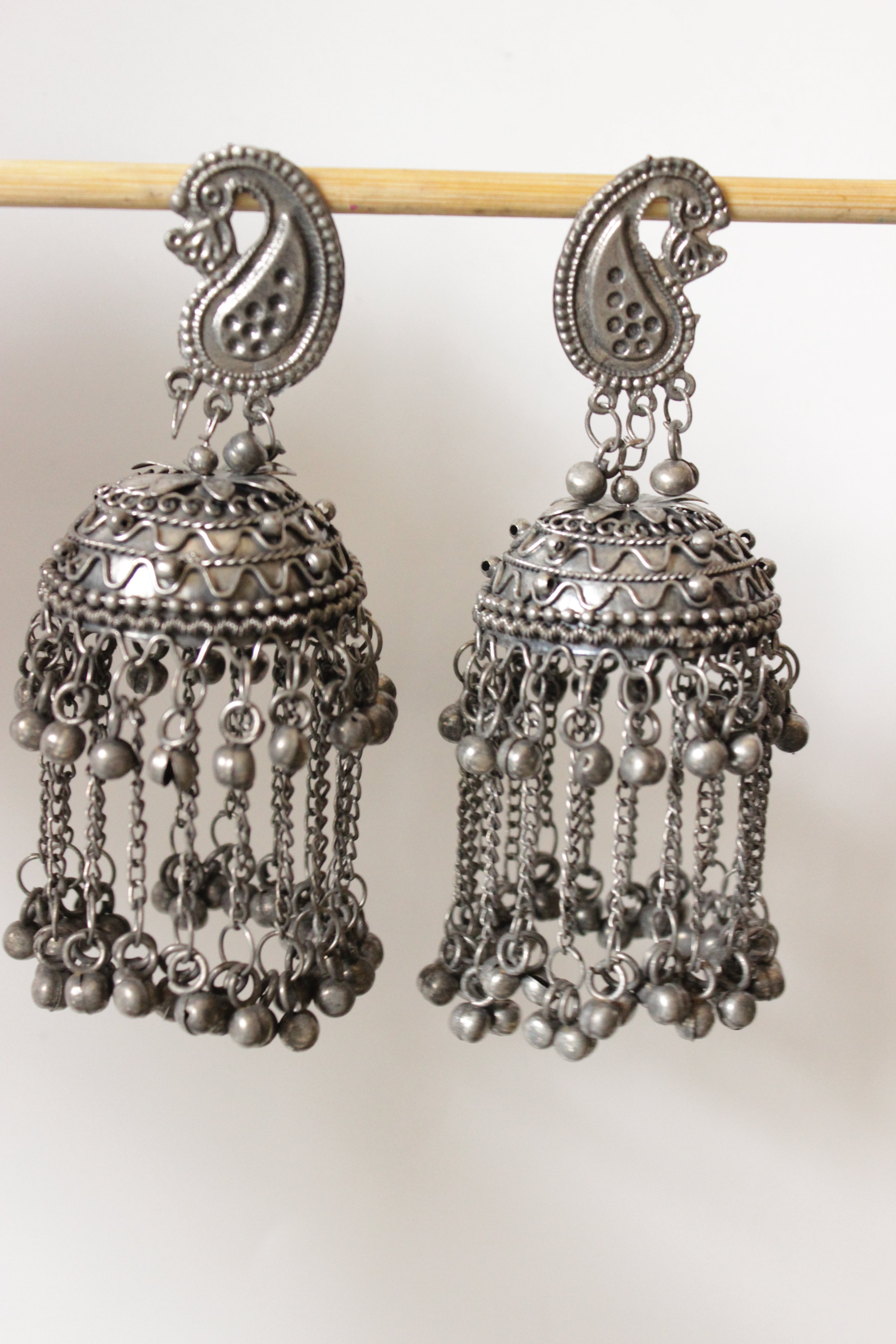 Peacock Motif Oxidised Finish Jhumka Earrings with Long Metal Beads Strands