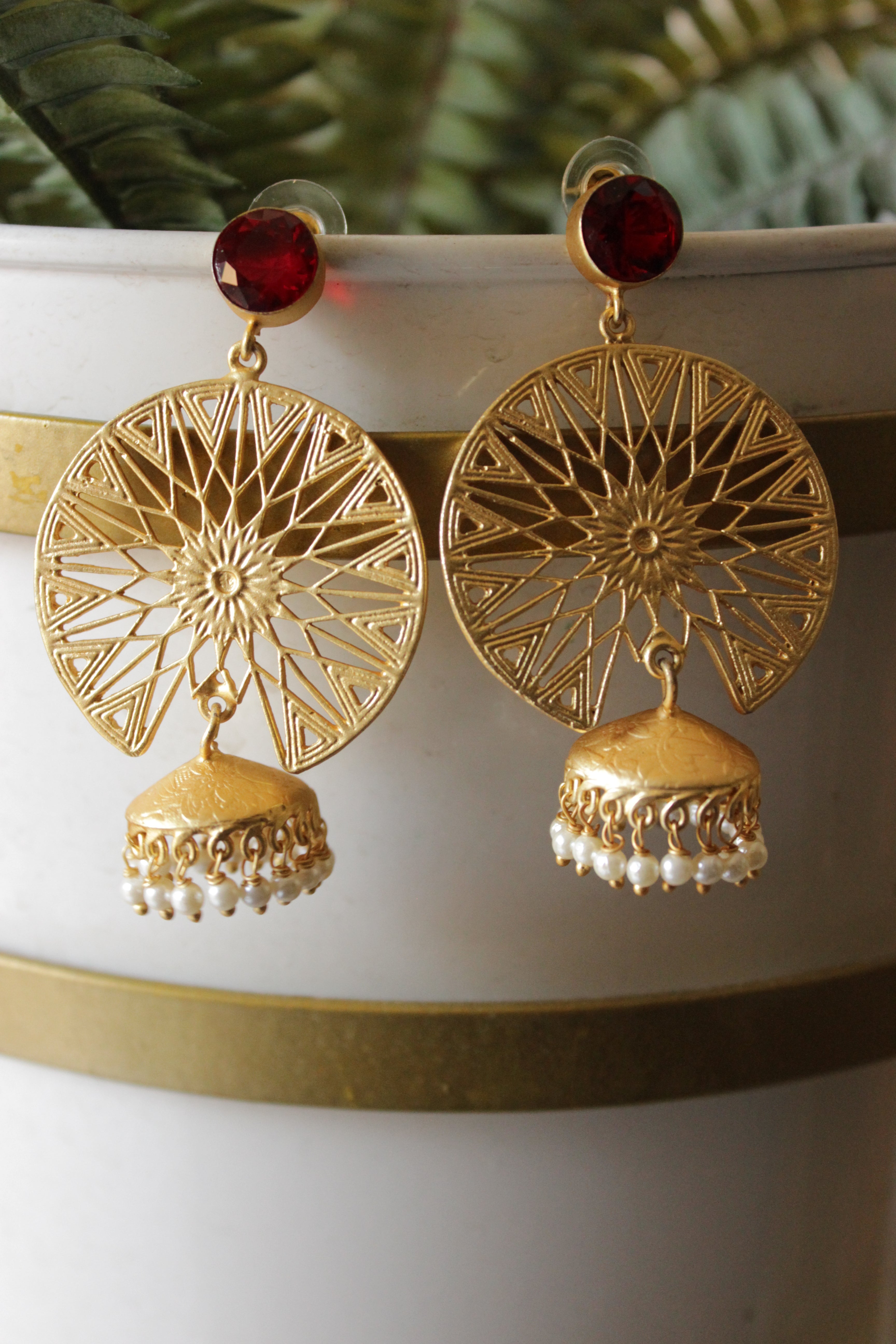 Red Natural Gemstone Embedded Gold Plated Intricately Detailed Jhumka Earrings