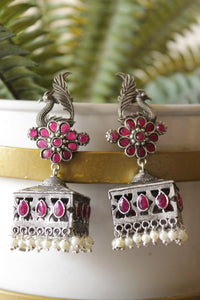 Ruby Pink Glass Stones Embedded Premium Oxidised Finish Peacock Motif Square Jhumka Earrings