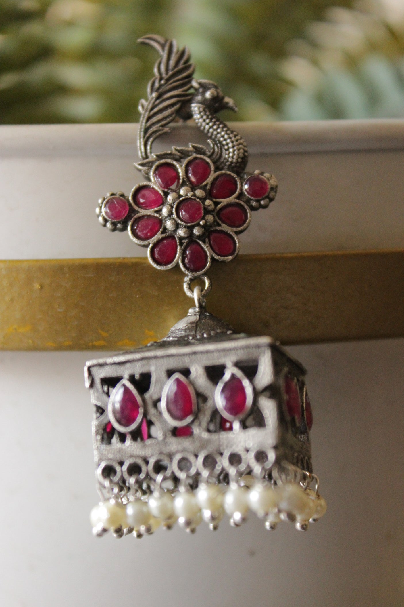 Ruby Pink Glass Stones Embedded Premium Oxidised Finish Peacock Motif Square Jhumka Earrings