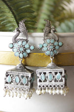 Load image into Gallery viewer, Turquoise Glass Stones Embedded Premium Oxidised Finish Peacock Motif Square Jhumka Earrings
