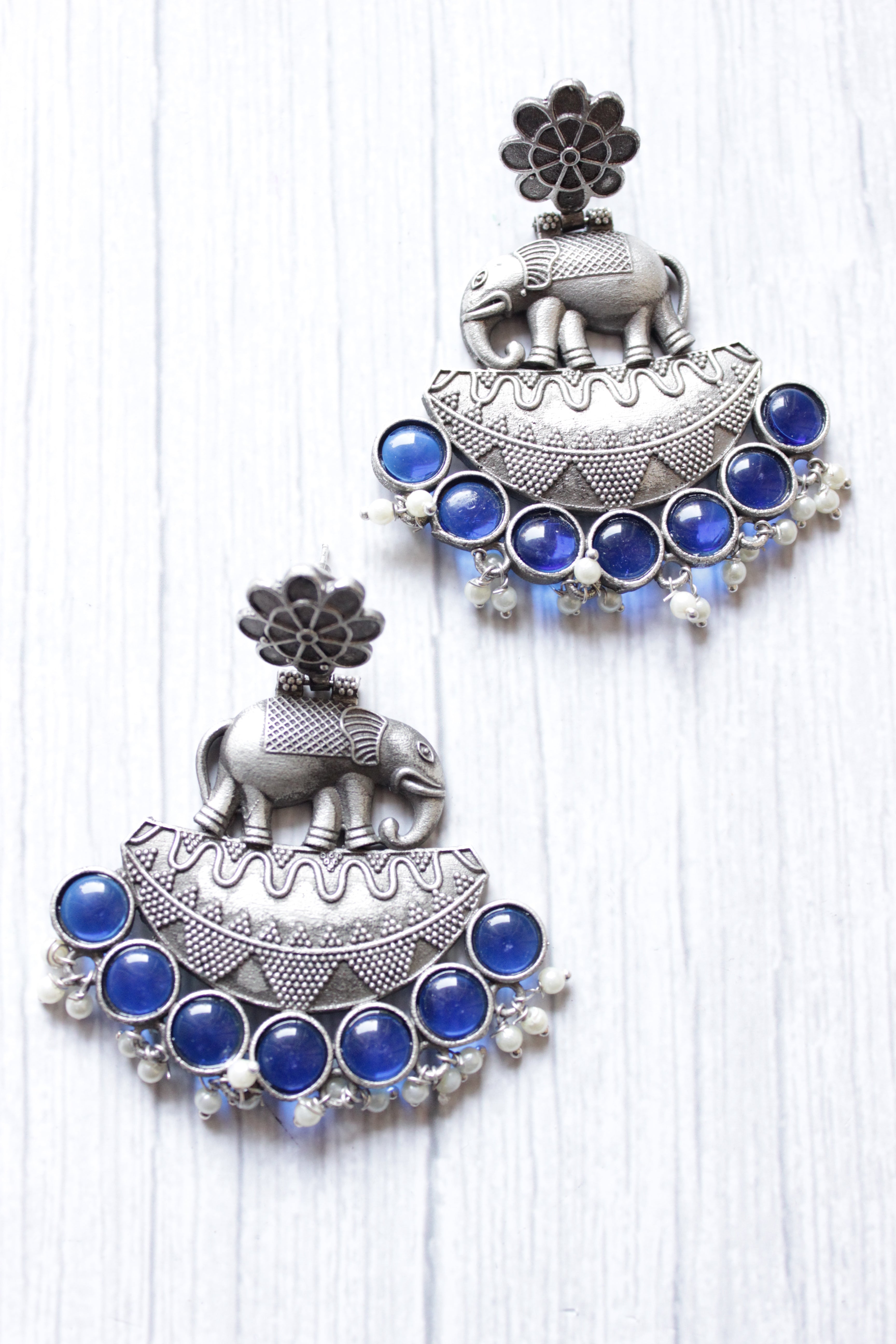 Blue Glass Stones Embedded Premium Oxidised Finish Elephant Motif Dangler Earrings