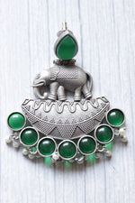 Load image into Gallery viewer, Bottle Green Glass Stones Embedded Premium Oxidised Finish Elephant Motif Dangler Earrings
