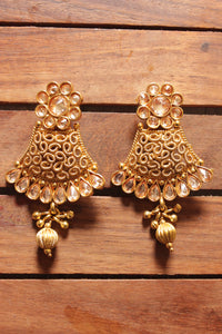 Gold Toned Kundan Stones Embedded Flower Motif Earrings