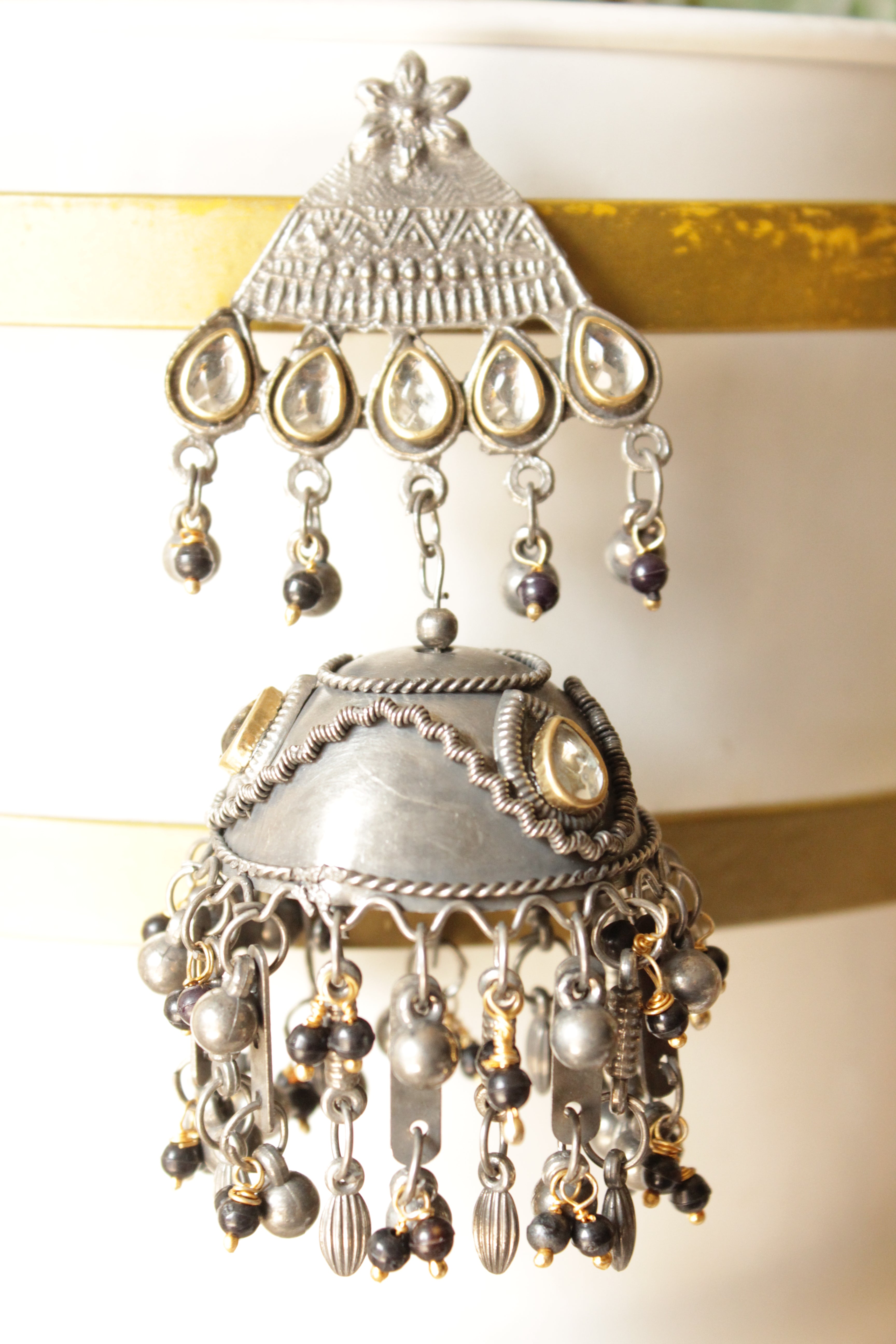 Dual Tone Kundan Stones Embedded Oxidised Finish Jhumka Earrings Finished with Black Beads