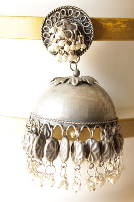 Dome Shaped Oxidised Finish Jhumka Earrings Accentuated with White Beads