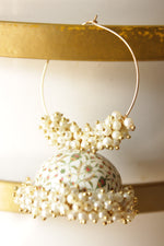 Load image into Gallery viewer, Acrylic Hand Painted Flowers Hoop Jhumka Earrings Embellished with White &amp; Golden Beads
